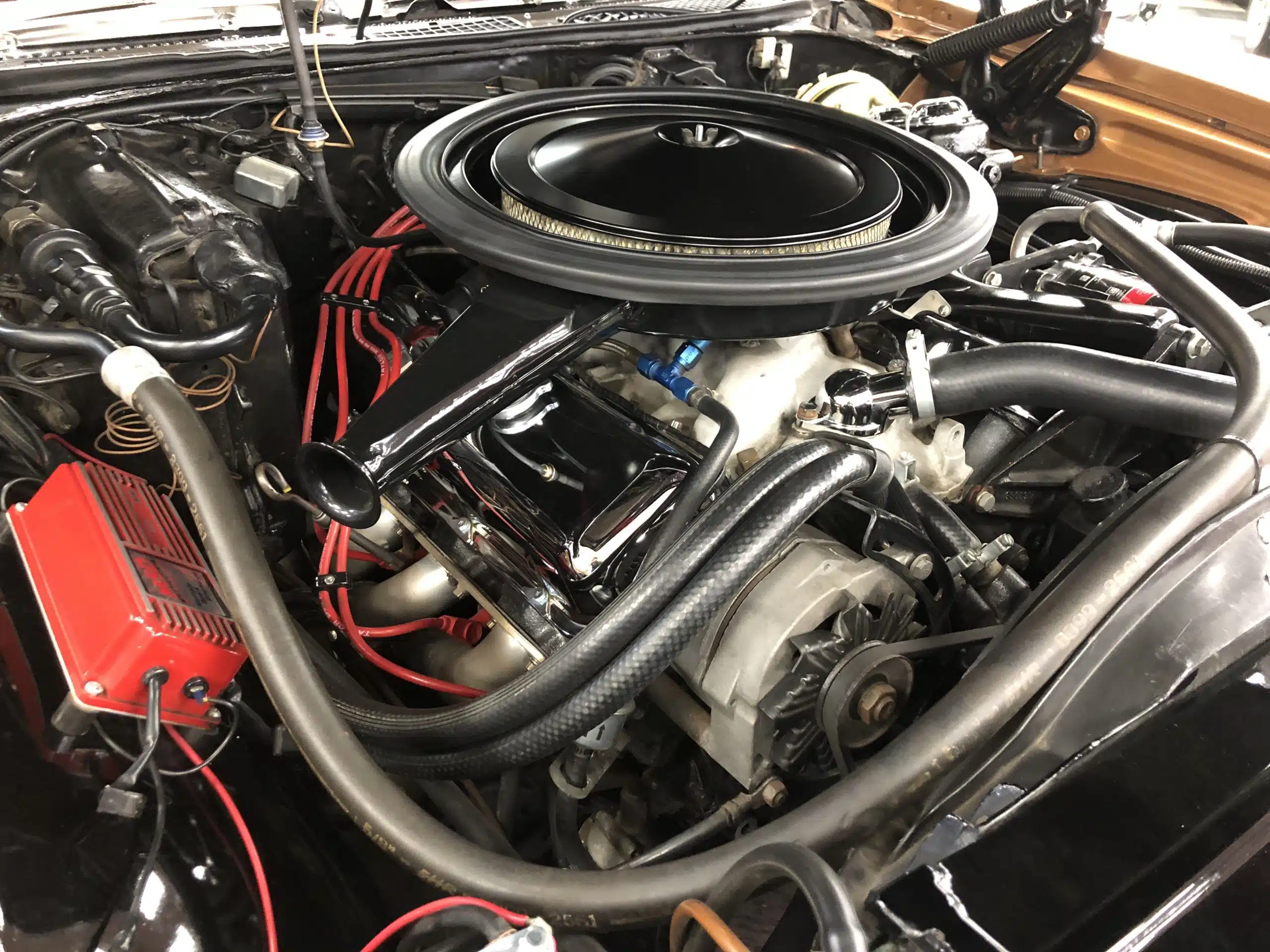 More familiar goodness.  There’s nothing like a big block engine room with a big carb, hi-performance intake, headers, and the complete cowl induction set up.  Notice the MSD box on the left.