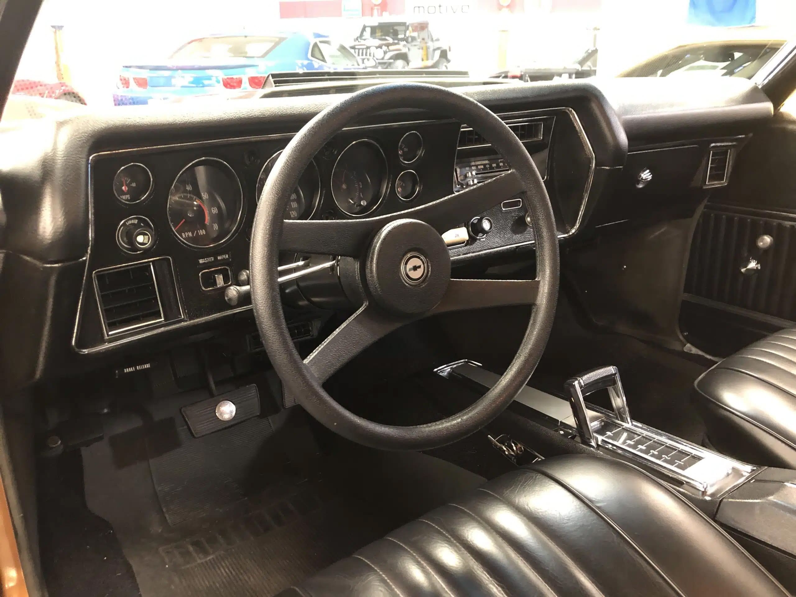 Let’s see.  Rally gauges, factory tach, center console, bucket seats, basket handle floor shifter, and yes, an 8-track player with a Zeppelin tape.